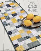 Mini Brick Road table runner, doll/mini quilt, and place mats sewing pattern from Atkinson Designs 2